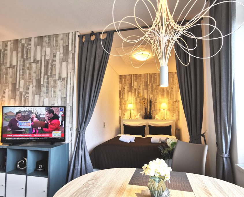 Wohnzimmer mit Schlafnische
